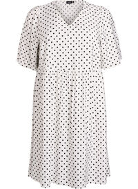 Dotted dress with V-neckline and A-line shape