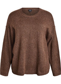 Loose knit sweater with prominent seams