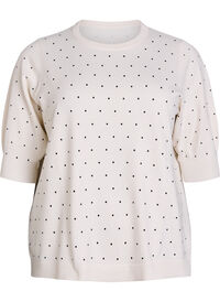 Knitted top with polka dot pattern and short sleeves